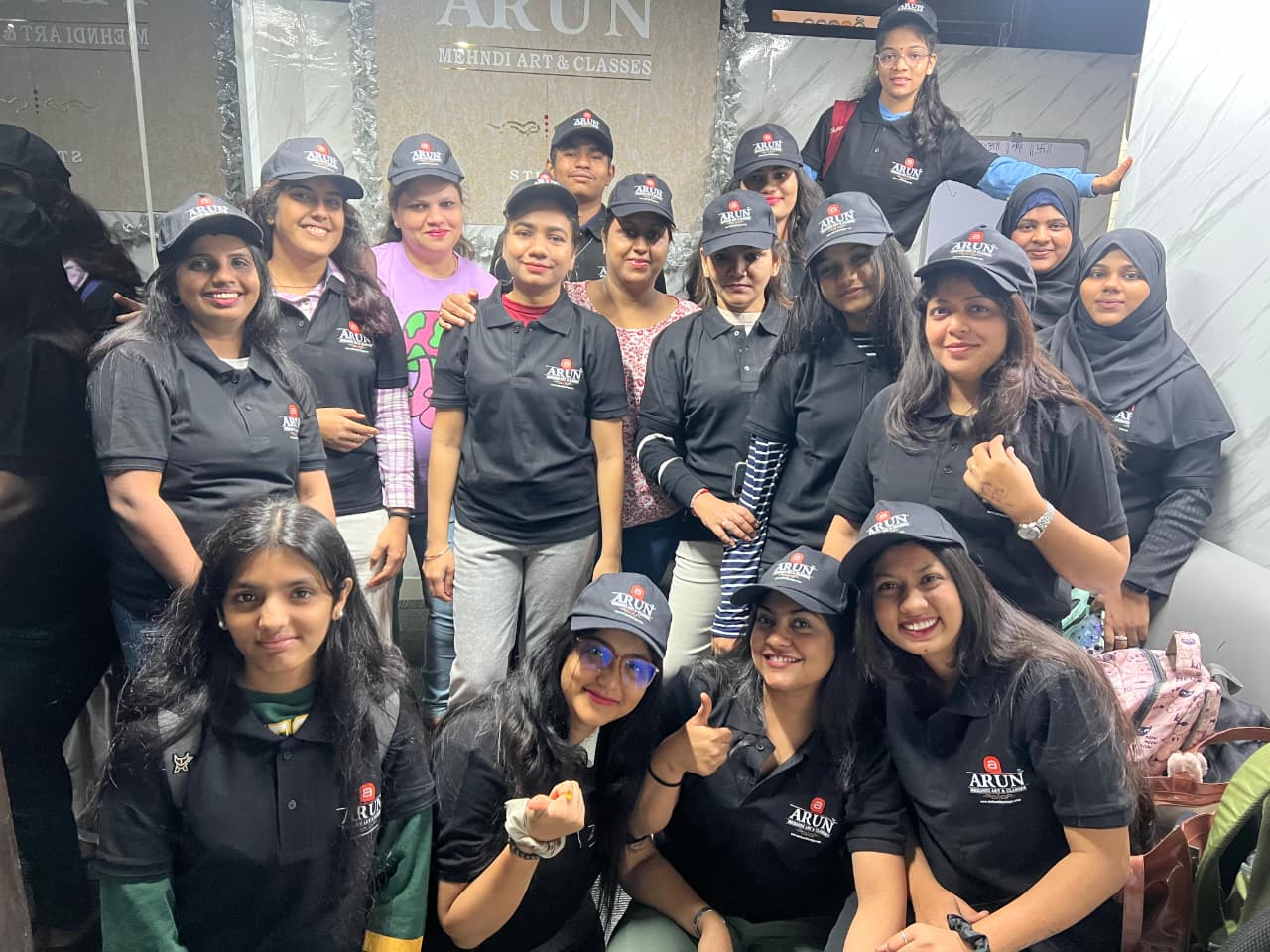 Artist applying mehndi to a bride